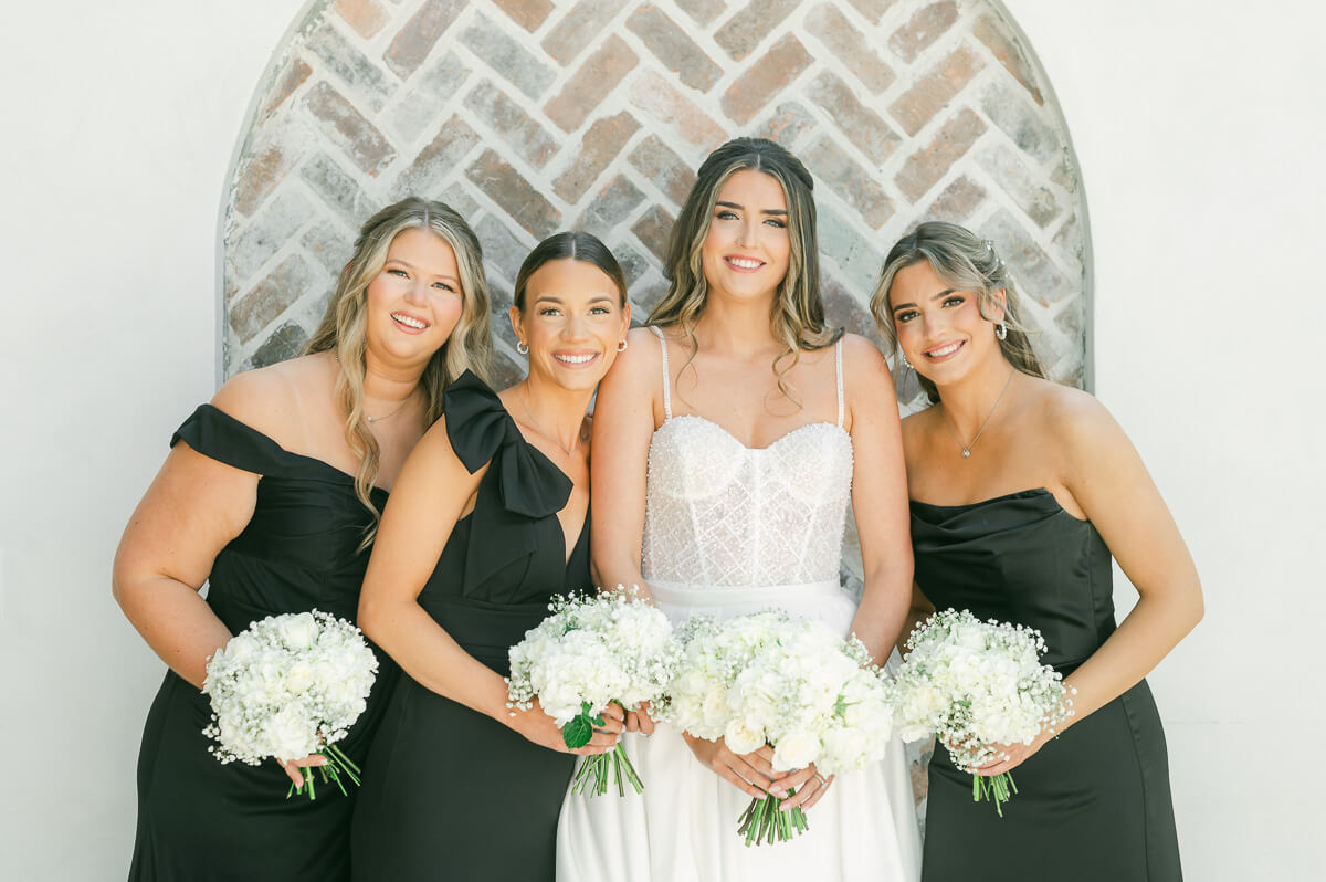 bridesmaids wearing black