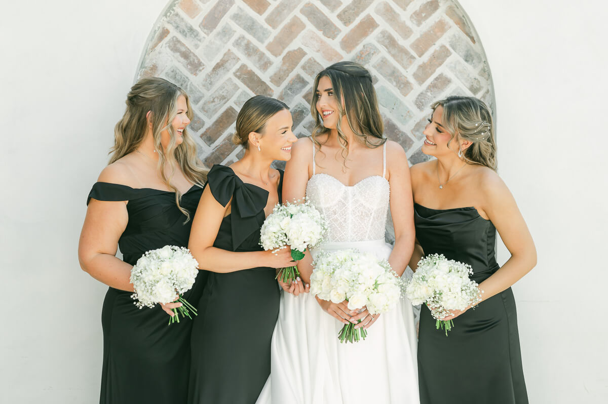 bridesmaids wearing black