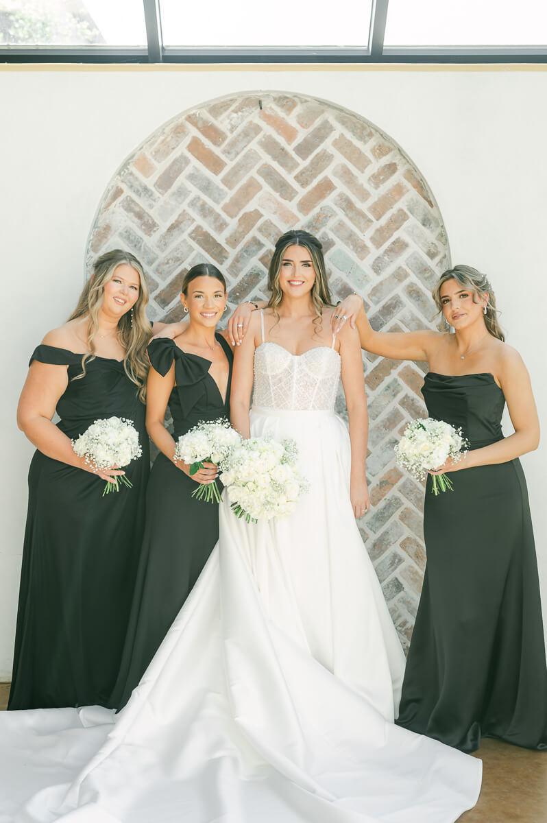 bridesmaids wearing black