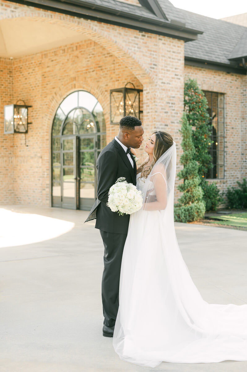 bride and groom posing for Montgomery, Tx wedding photographer