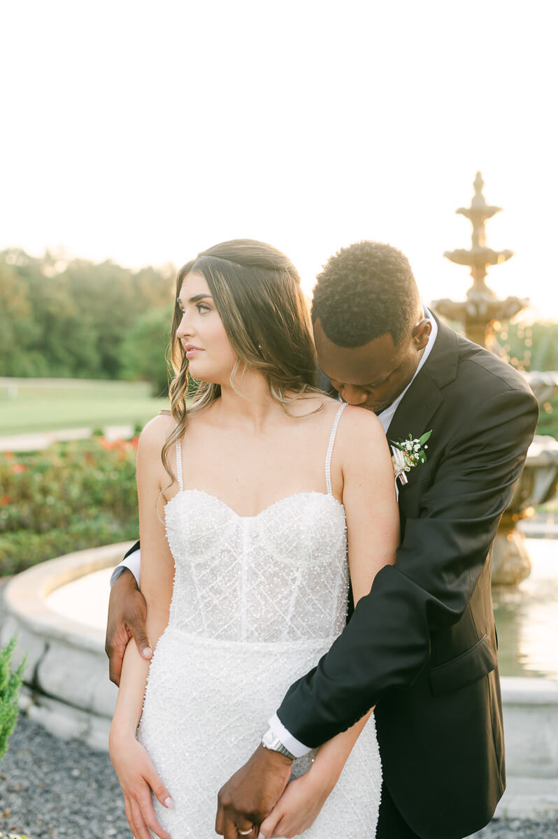 bride and groom posing for Houston wedding photographer