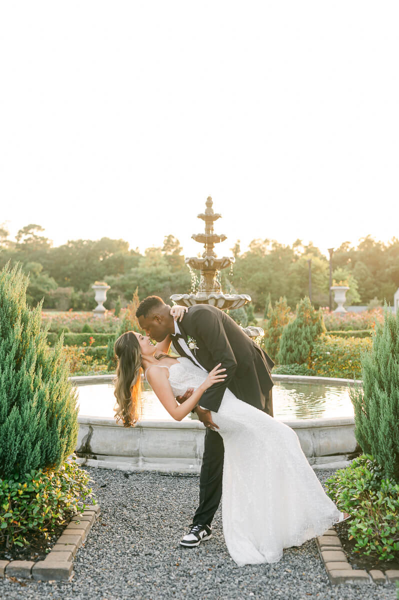 bride and groom posing for Houston wedding photographer