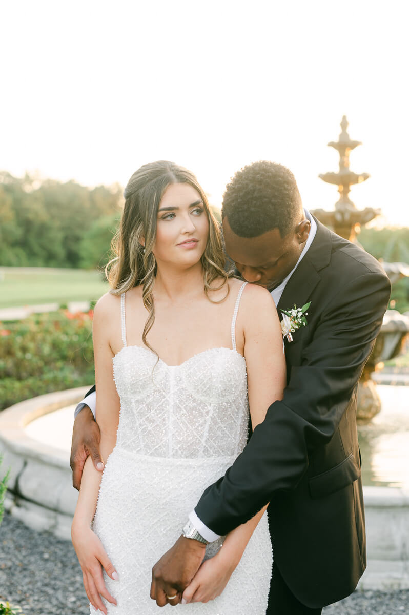 bride and groom posing for Houston wedding photographer