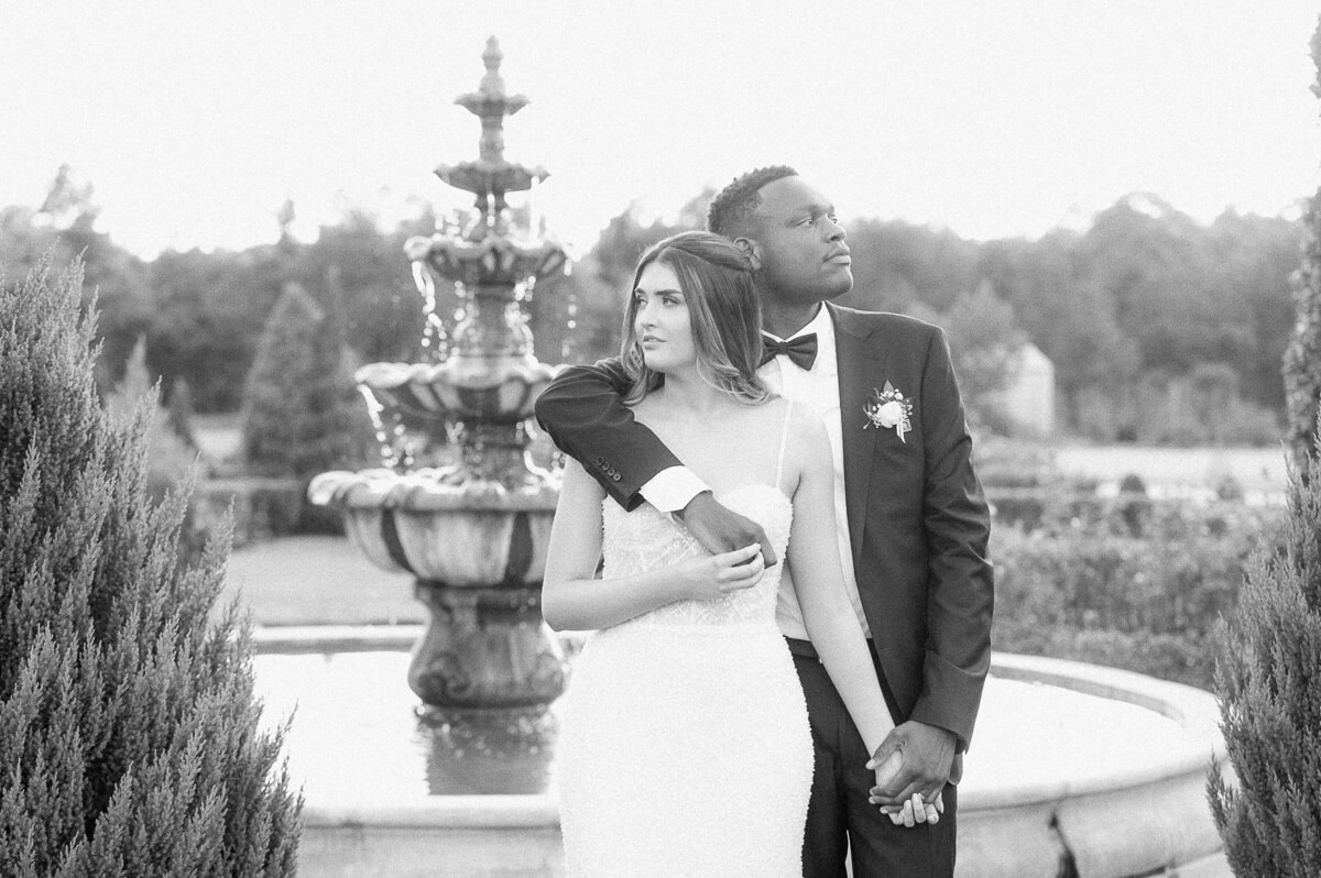 bride and groom posing for Houston wedding photographer