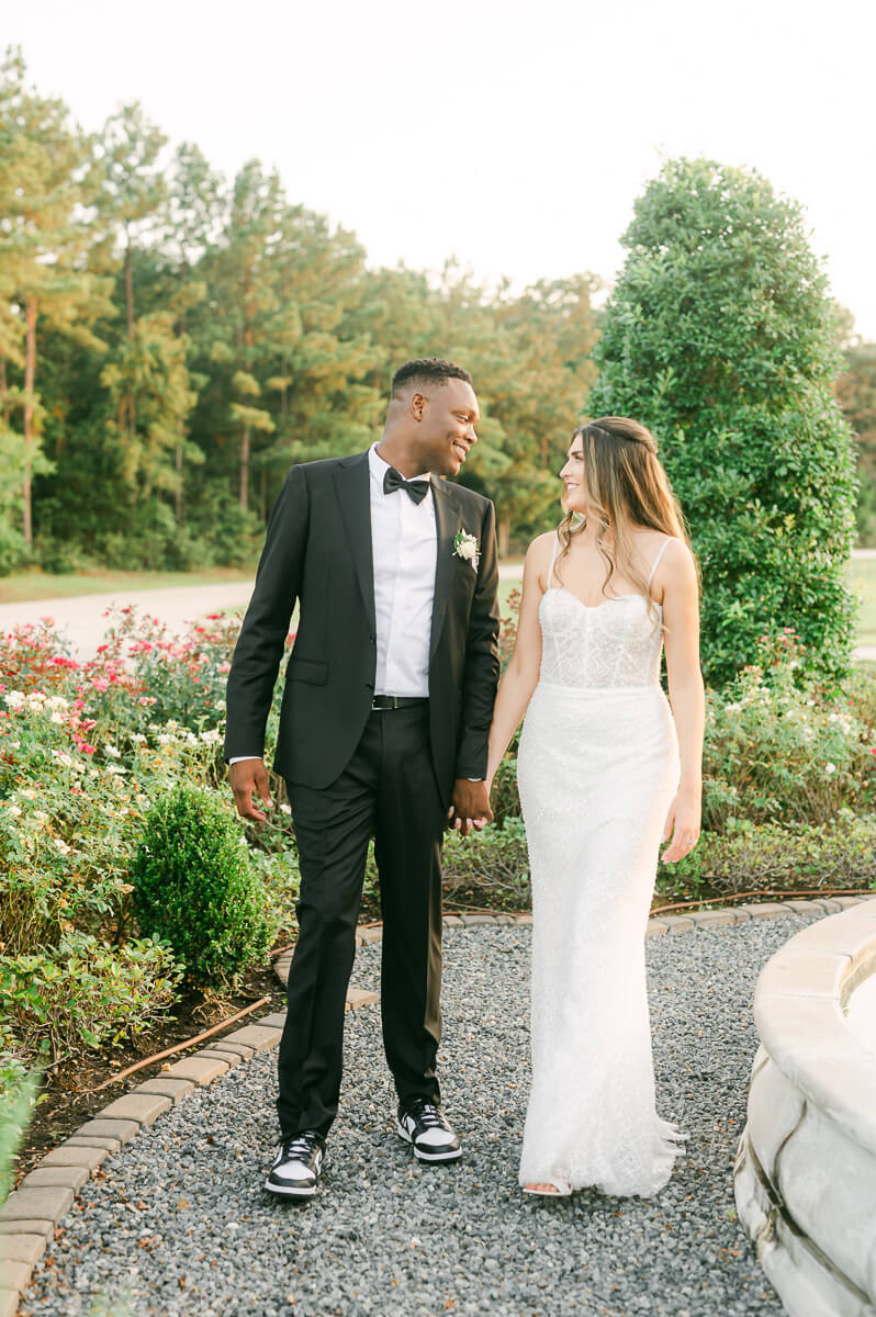 bride and groom posing for Houston wedding photographer