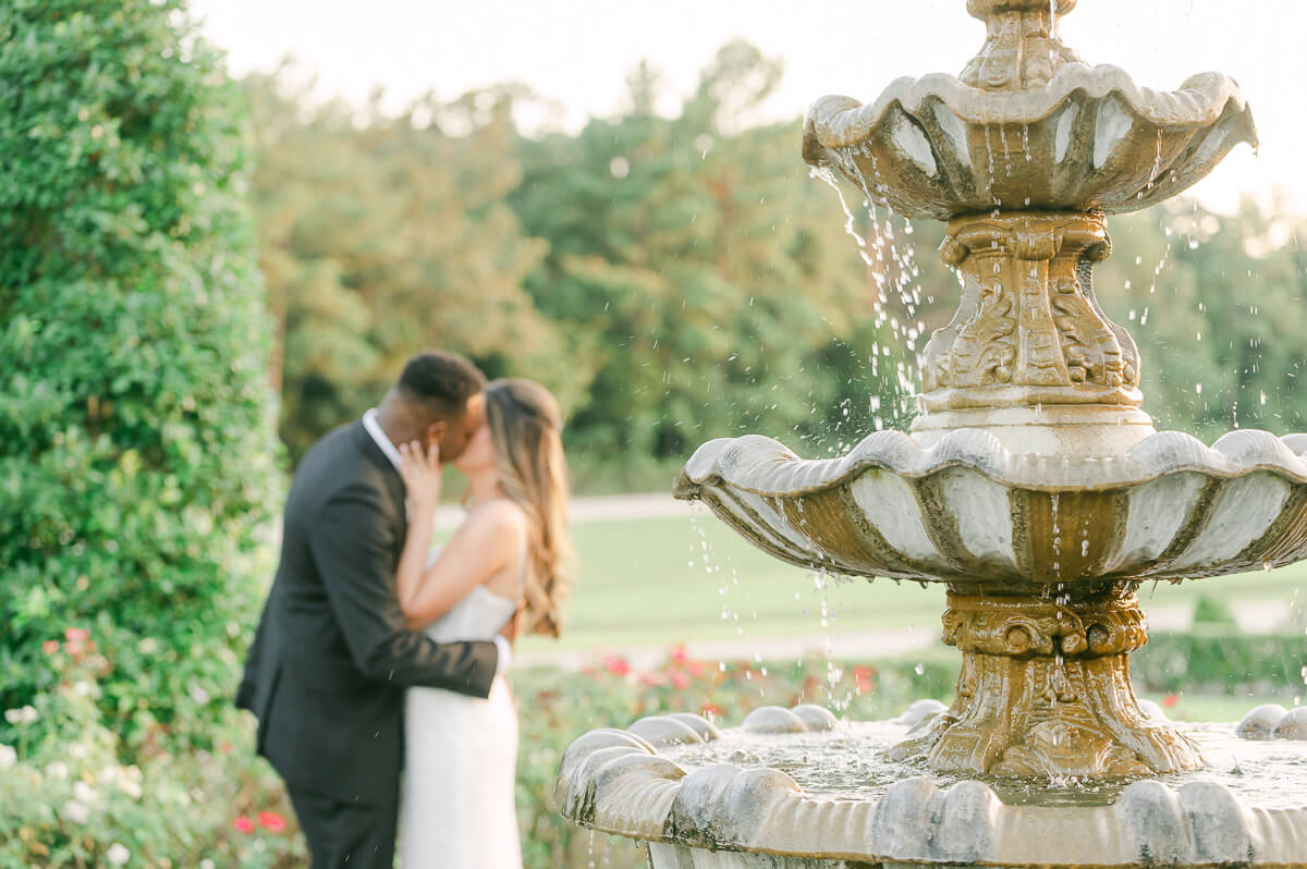 bride and groom posing for Houston wedding photographer