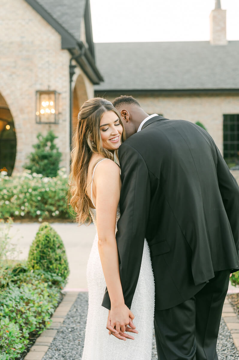 bride and groom posing for Houston wedding photographer