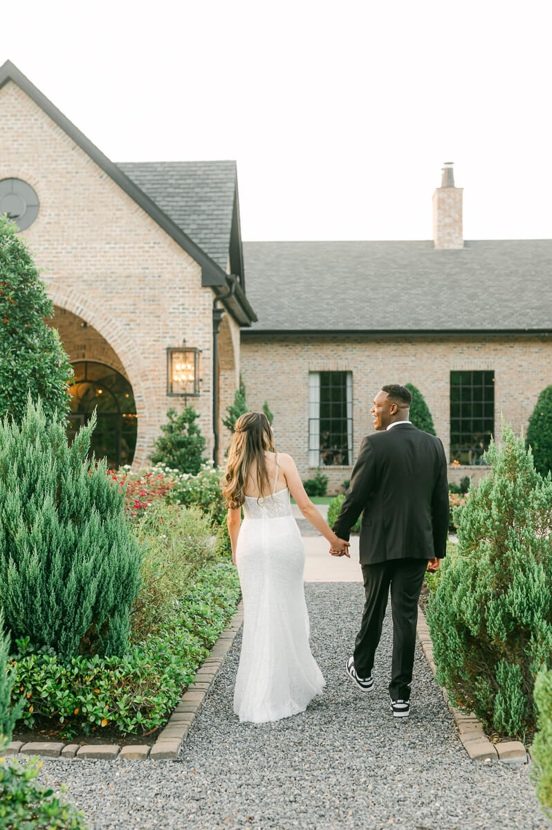 bride and groom posing for Houston wedding photographer