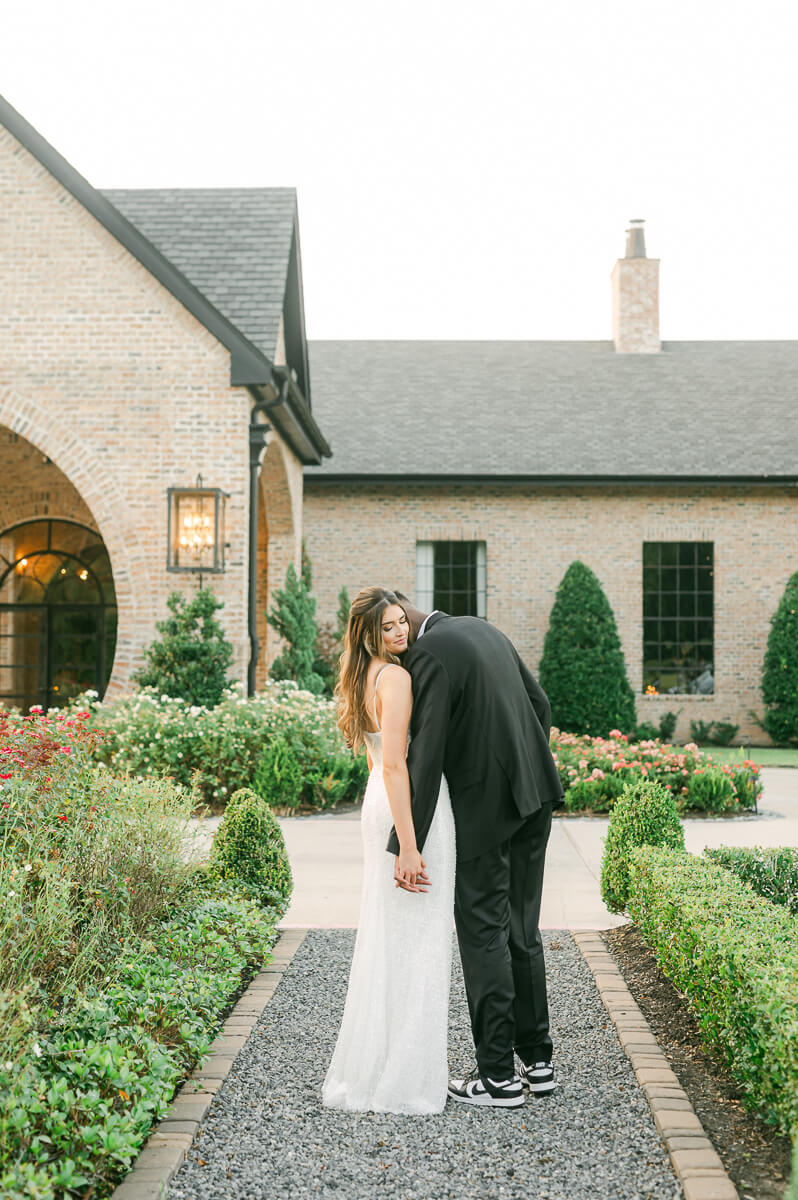 bride and groom posing for Houston wedding photographer