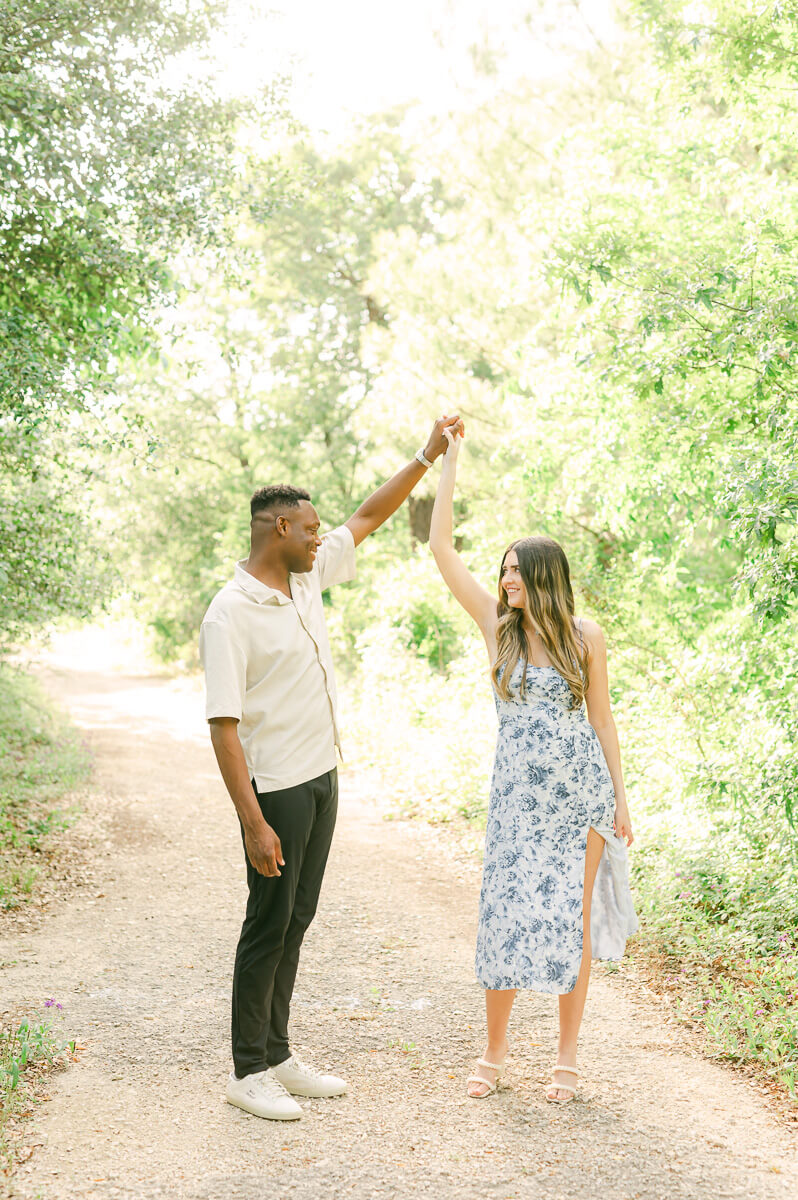engaged couple dancing during Houston engagement session
