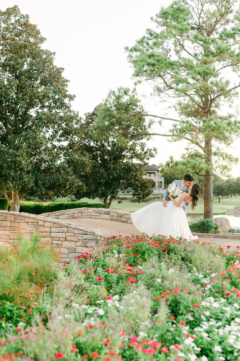 bride and groom posing for Houston wedding photographer