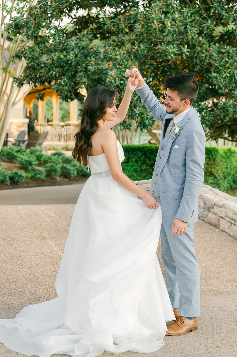 bride and groom posing for Houston wedding photographer