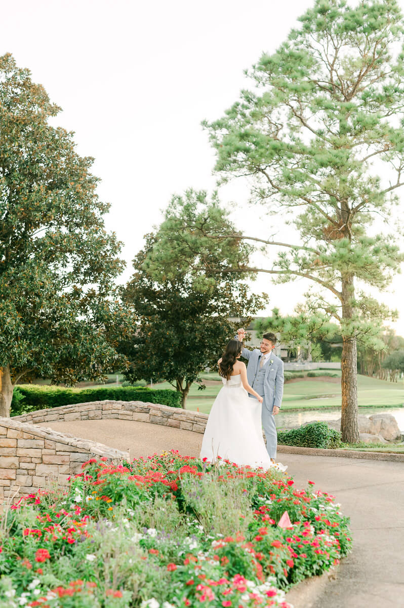 bride and groom posing for Houston wedding photographer