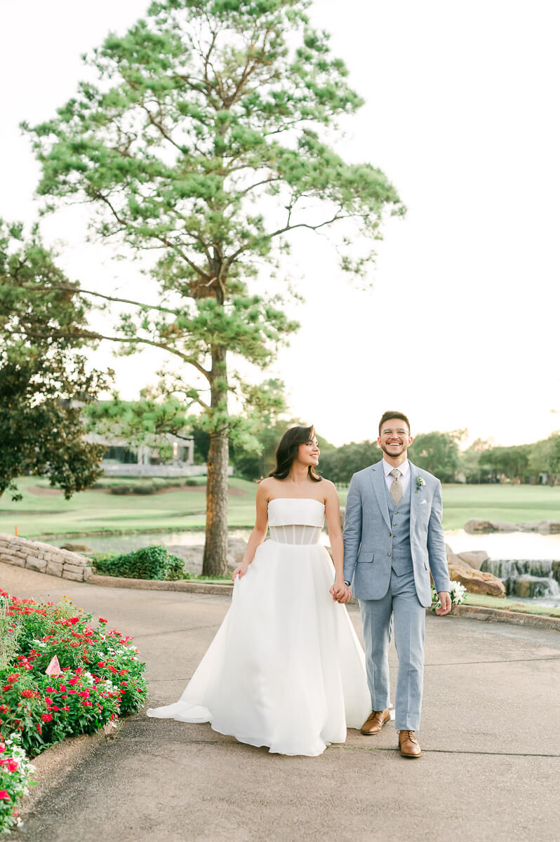 bride and groom posing for Houston wedding photographer