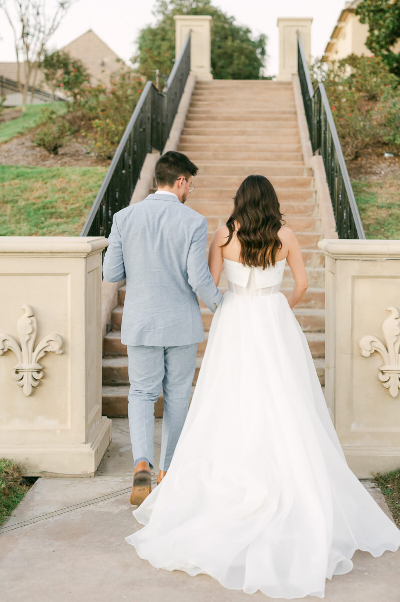 bride and groom posing for Houston wedding photographer