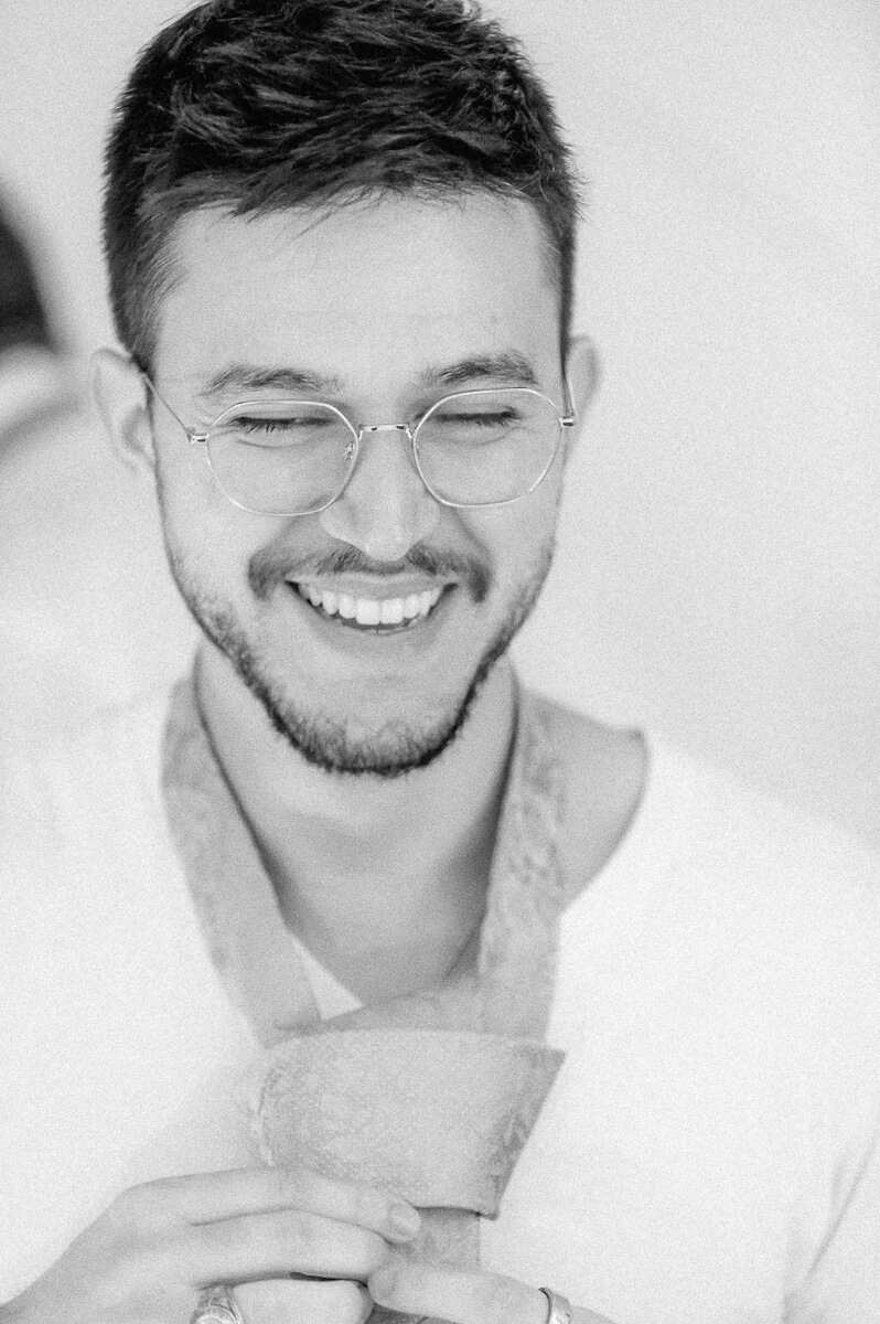 groom getting ready by Houston wedding photographer