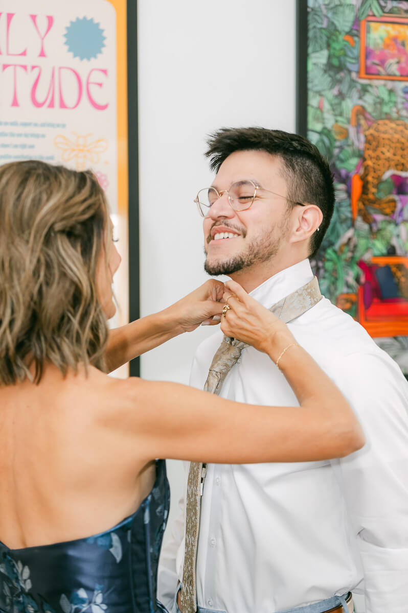 groom getting ready by Houston wedding photographer