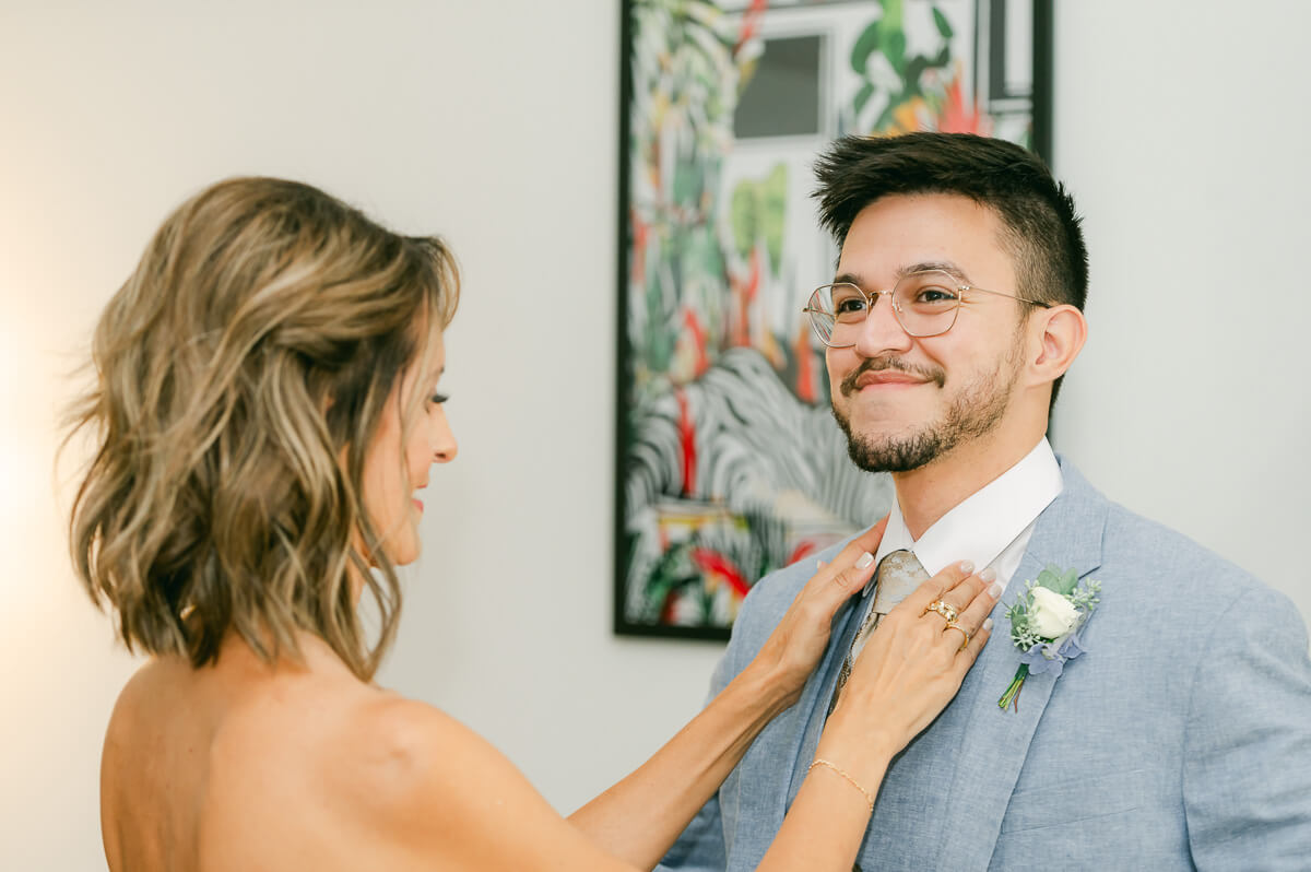 groom getting ready by Houston wedding photographer