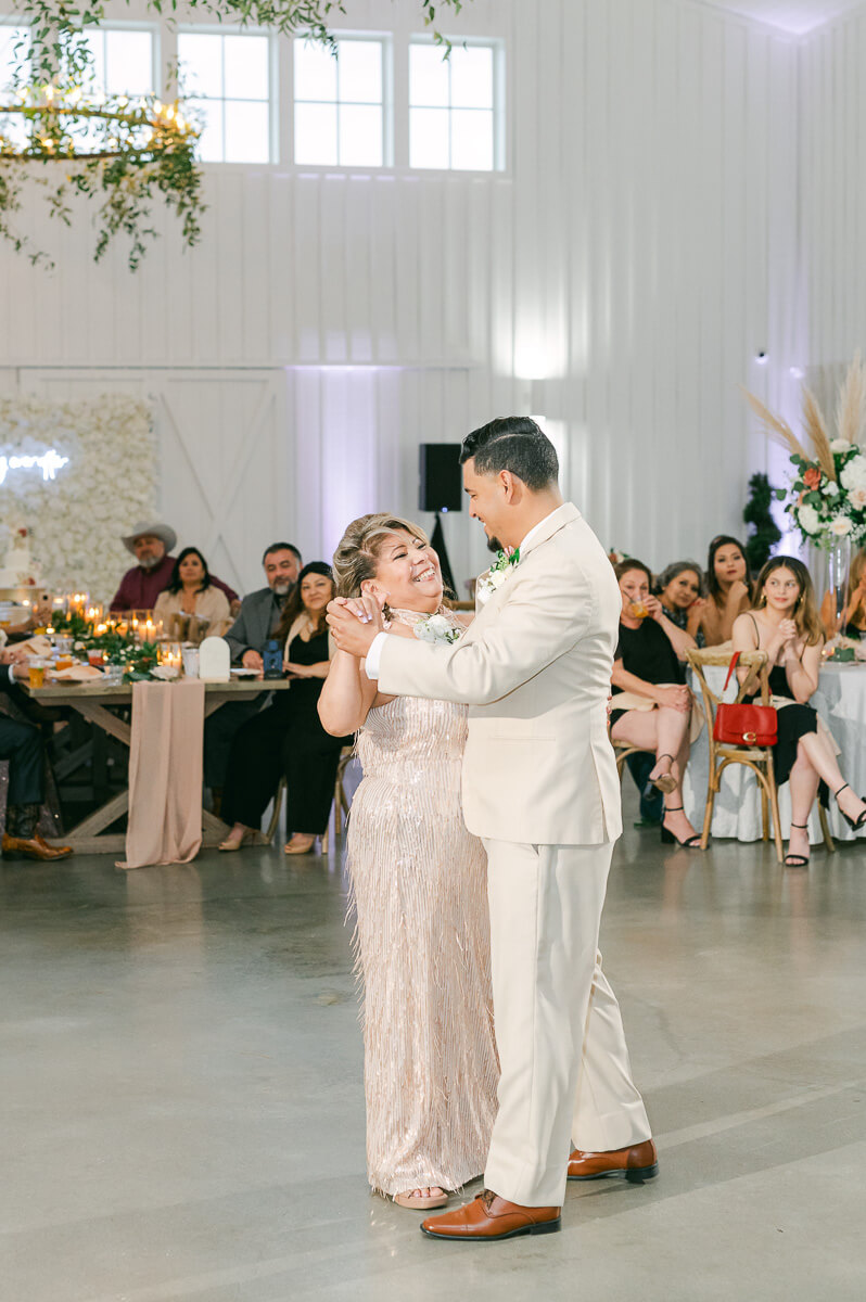 mother son dance by Houston wedding photographer