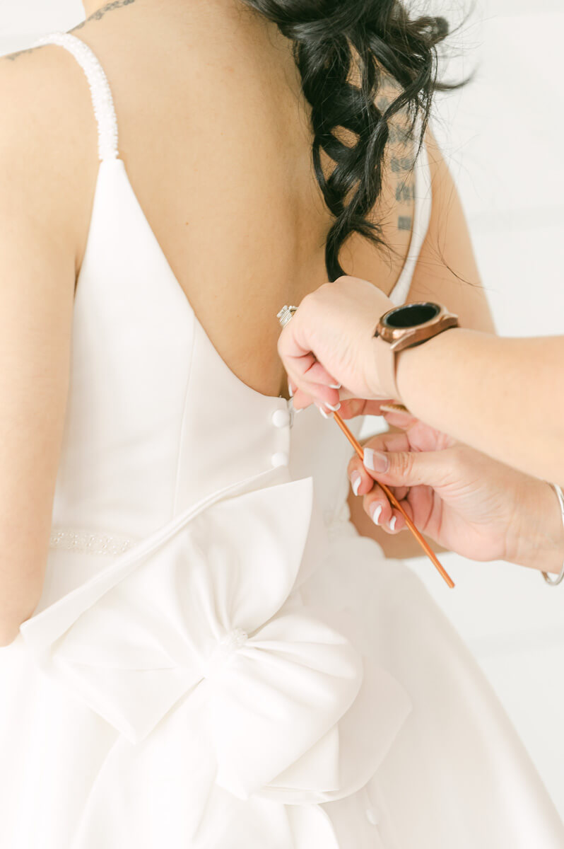 bride getting ready at the farmhouse in Montgomery 