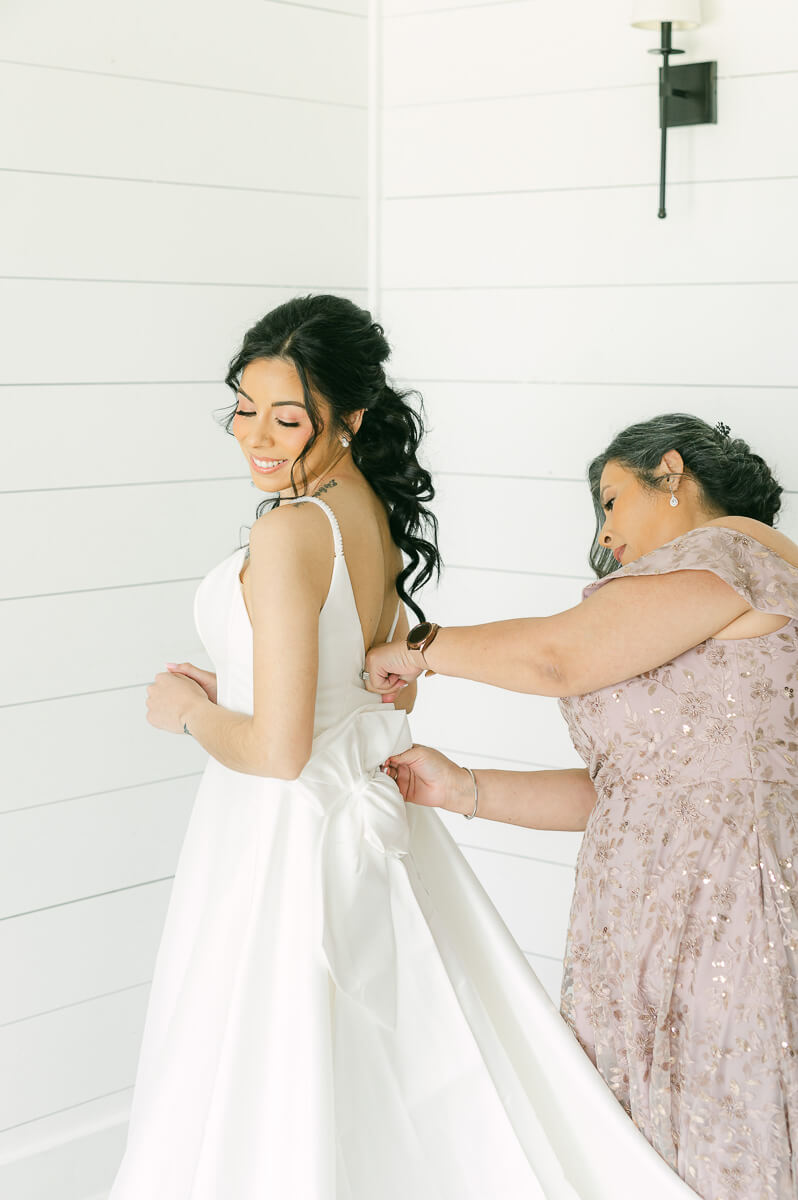 bride getting ready at the farmhouse in Montgomery 