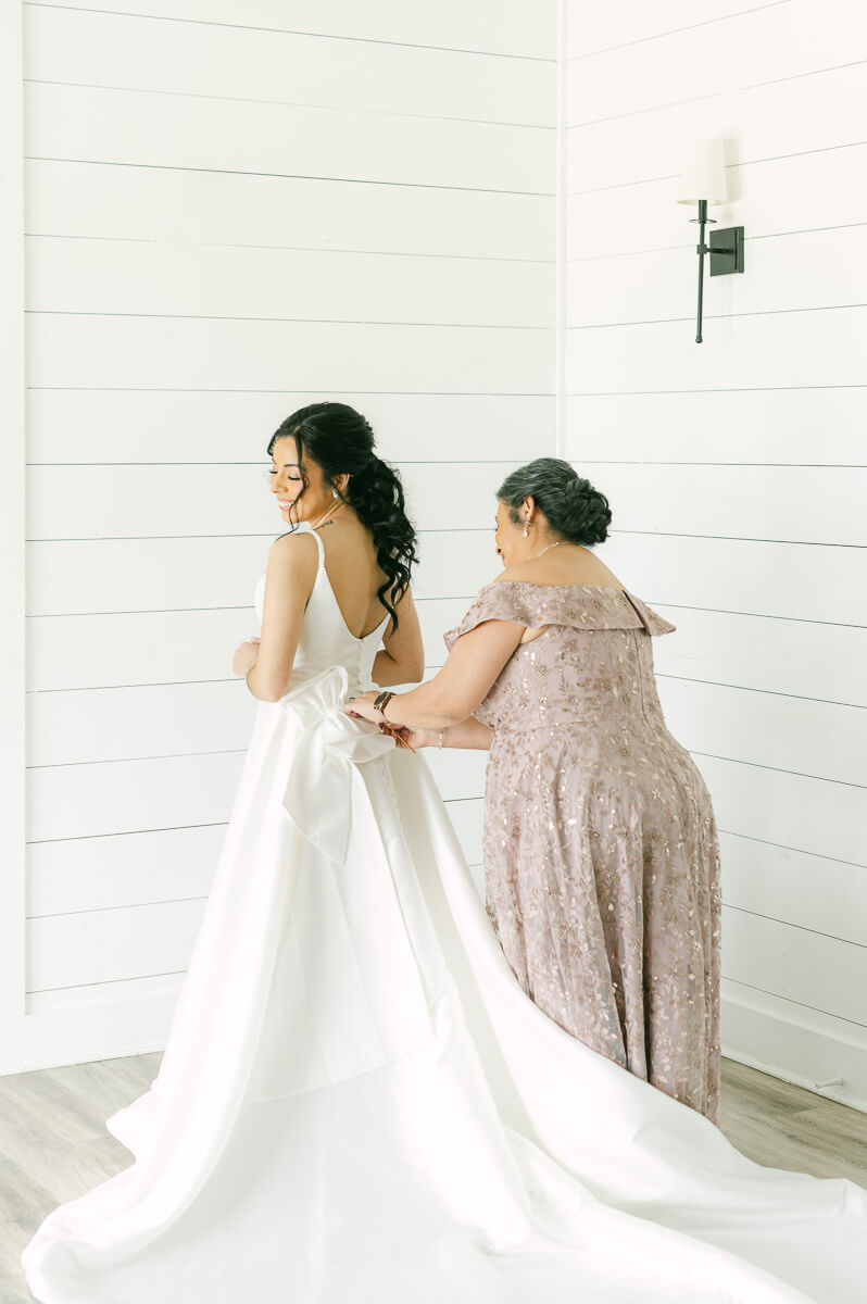 bride getting ready at the farmhouse in Montgomery 