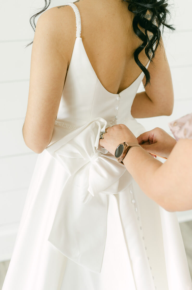 bride getting ready at the farmhouse in Montgomery 