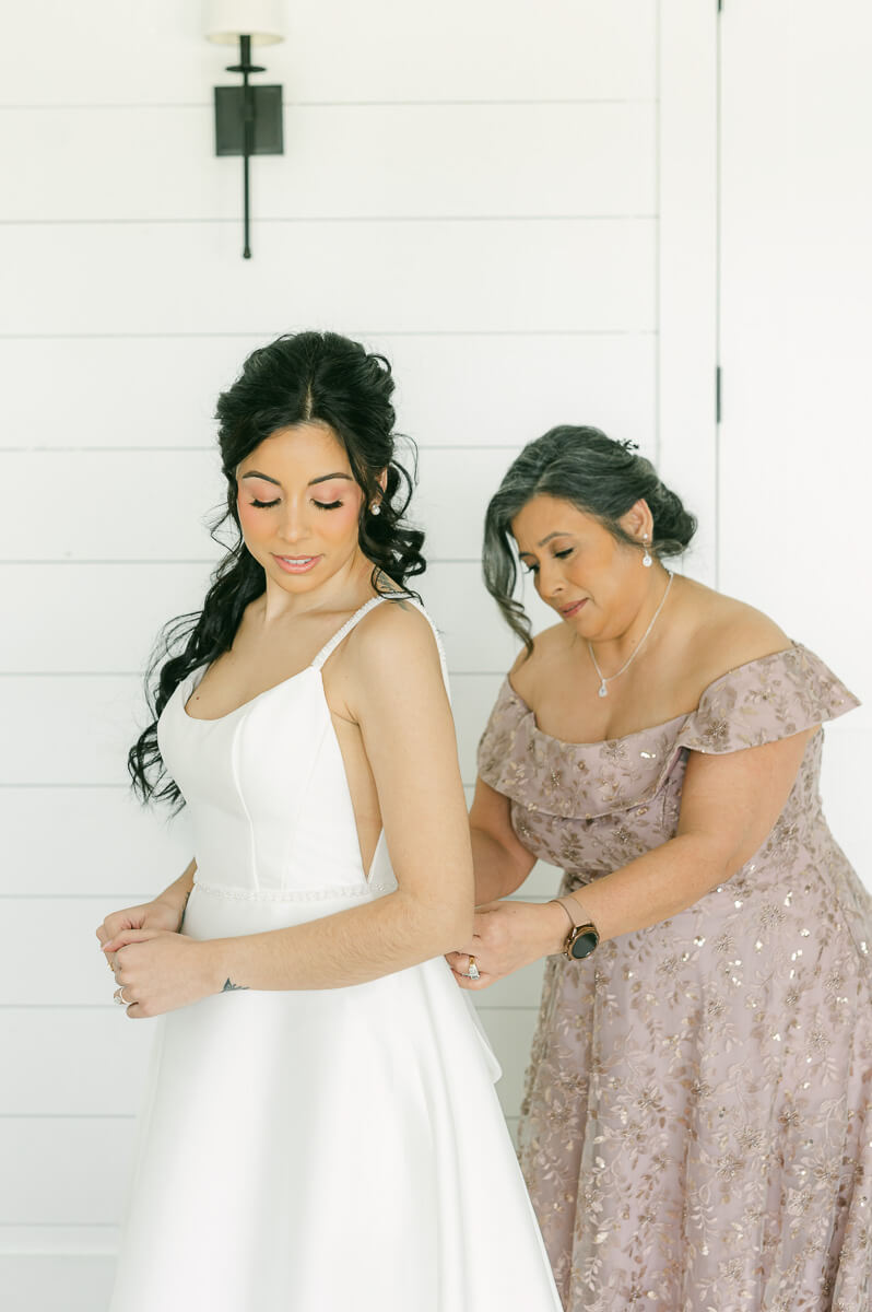 bride getting ready at the farmhouse in Montgomery 