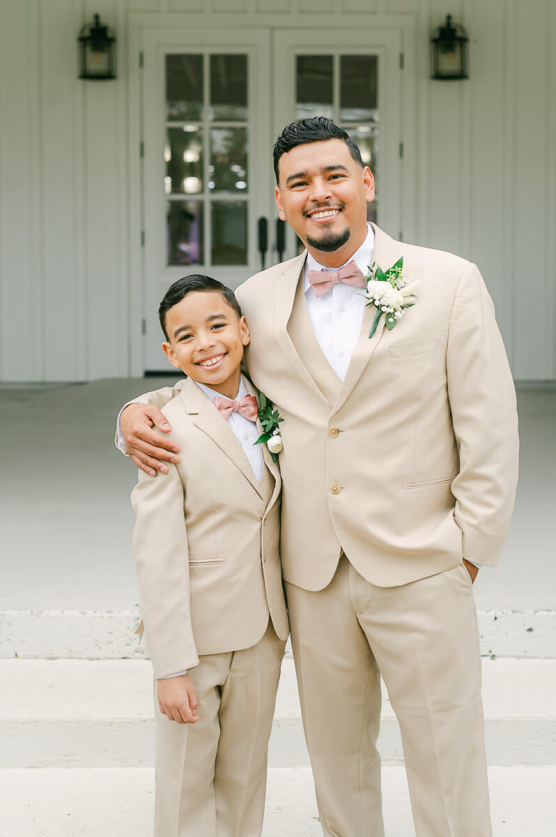 groomsmen portraits at the farmhouse wedding venue