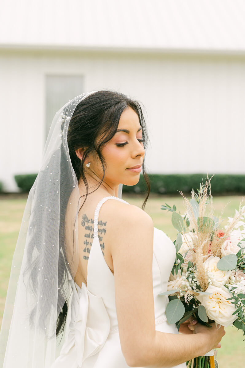 bride at her wedding at the farmhouse