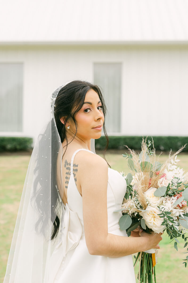 bride at her wedding at the farmhouse