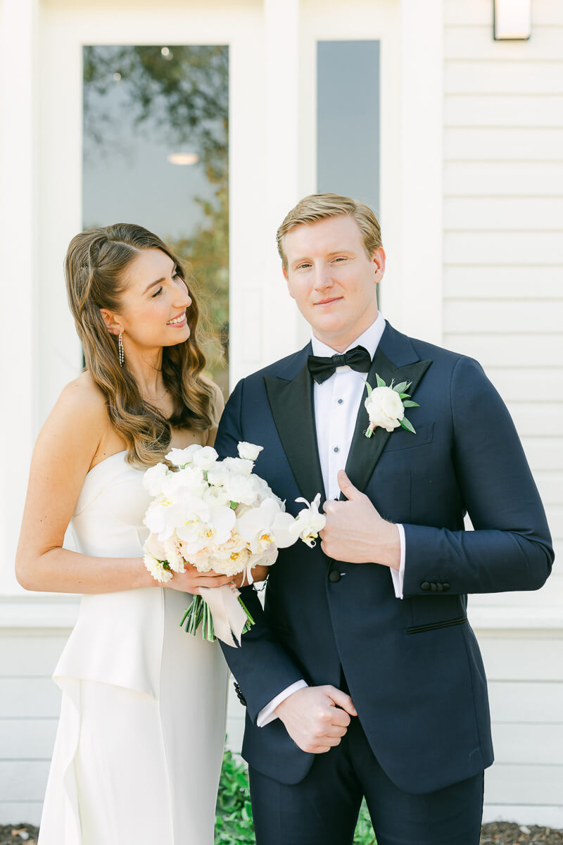 couple posing on wedding day at the grand lady