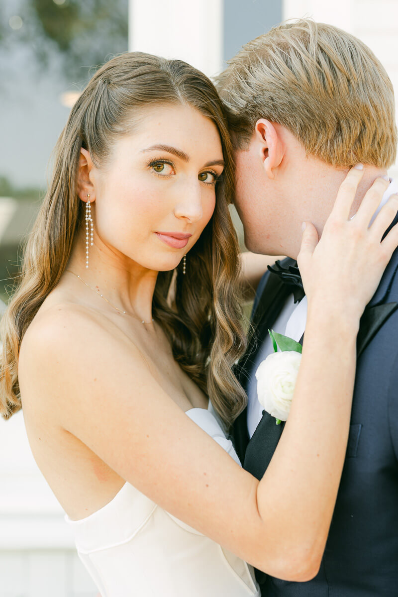 couple posing on wedding day at the grand lady