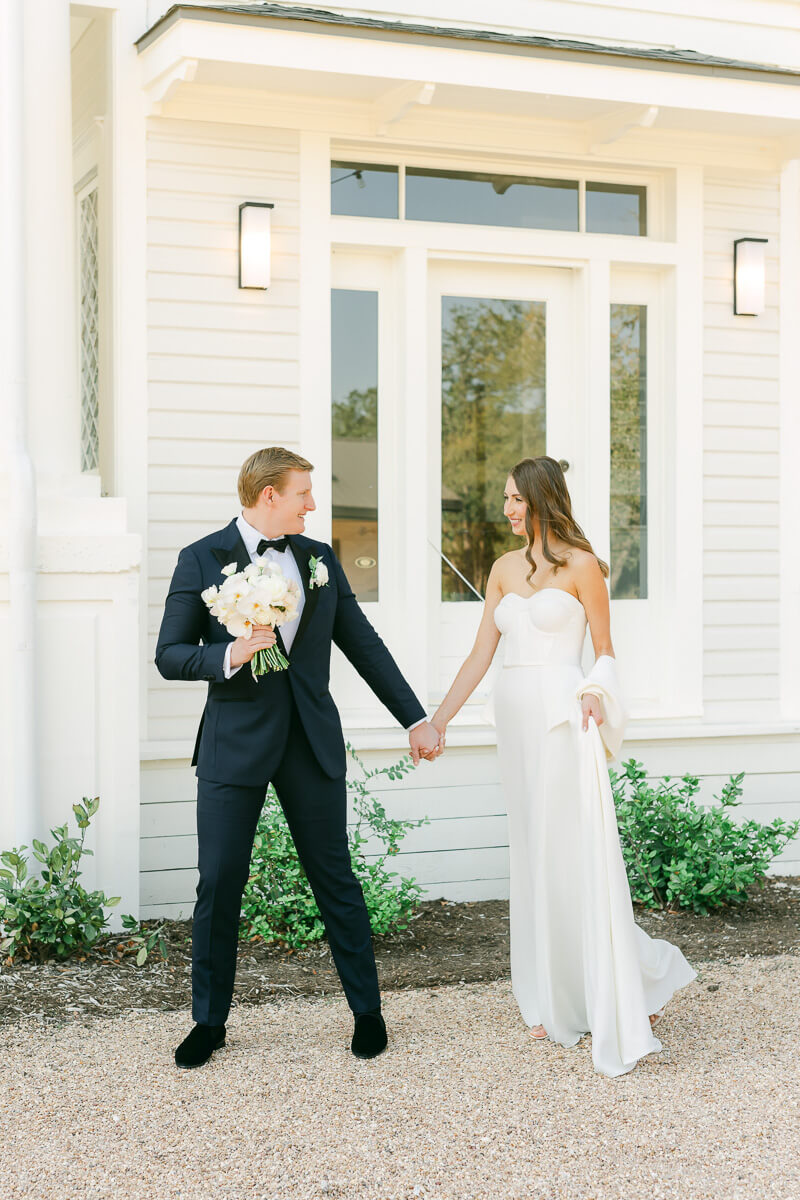 couple posing on wedding day at the grand lady