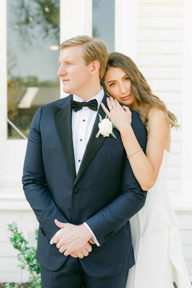 couple posing on wedding day at the grand lady