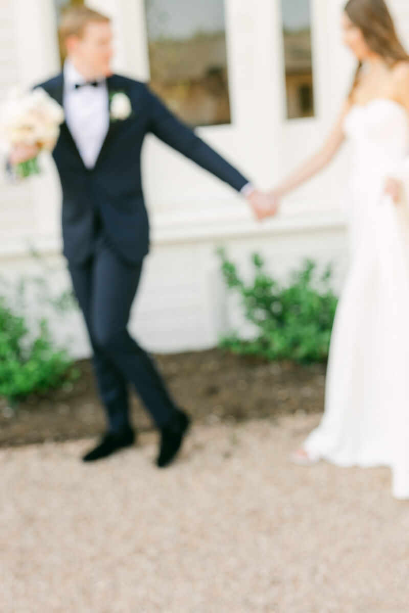 couple posing on wedding day at the grand lady