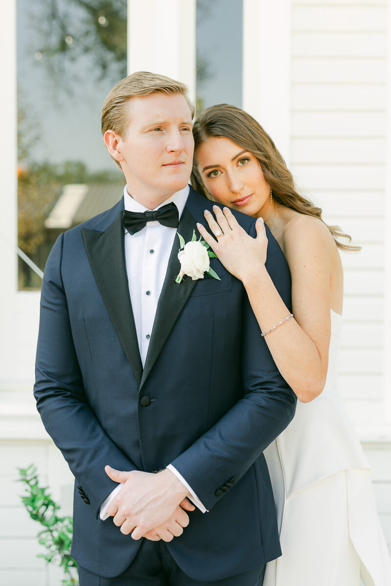 couple posing on wedding day at the grand lady