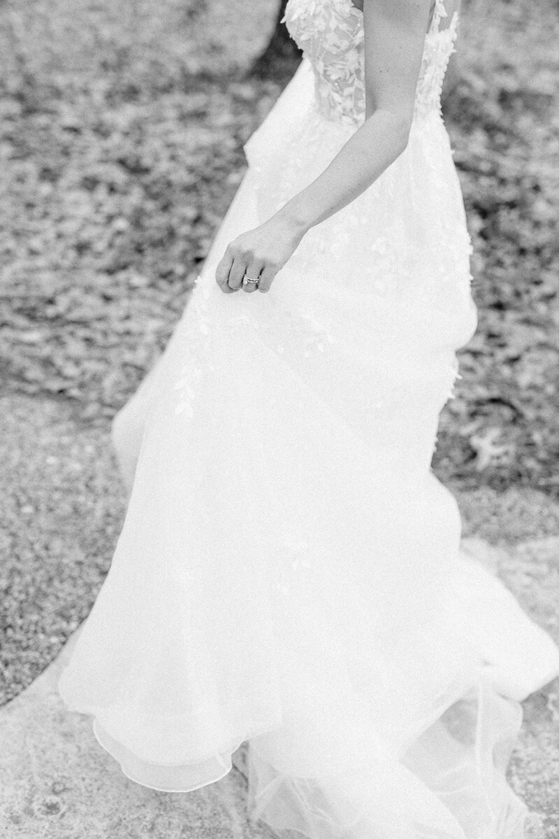 delicate black and white photo of wedding dress