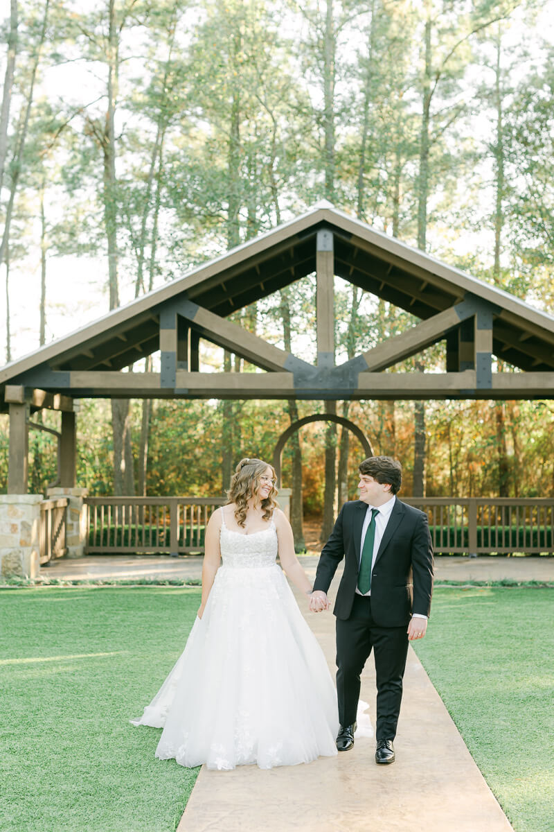 couple walking at the springs magnolia