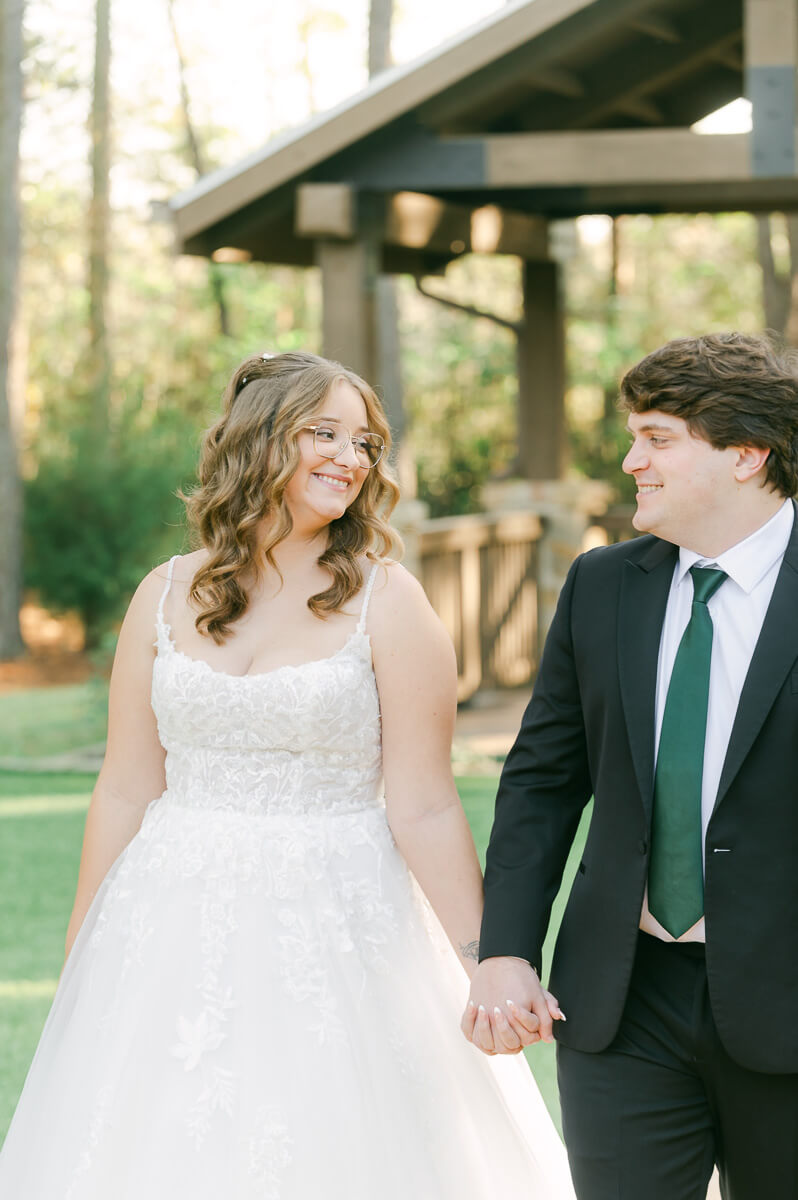 couple walking at the springs magnolia