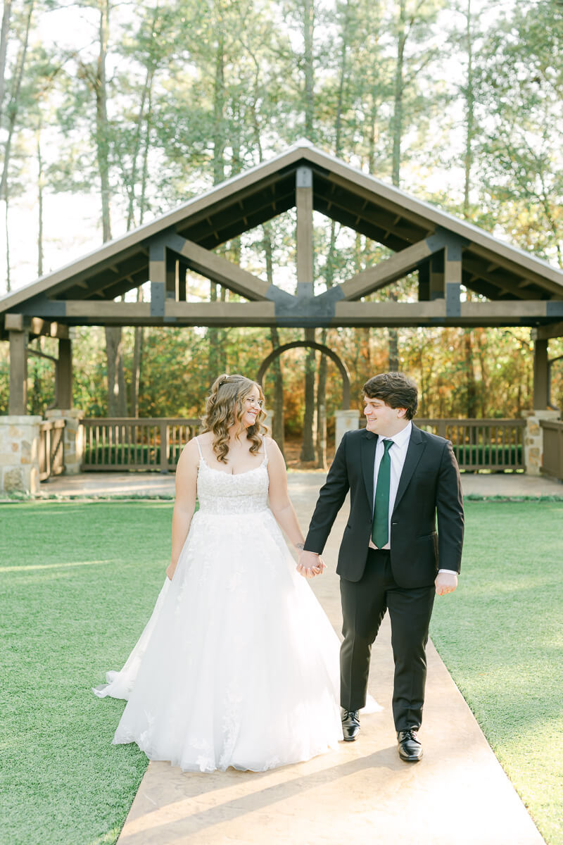 couple walking at the springs magnolia