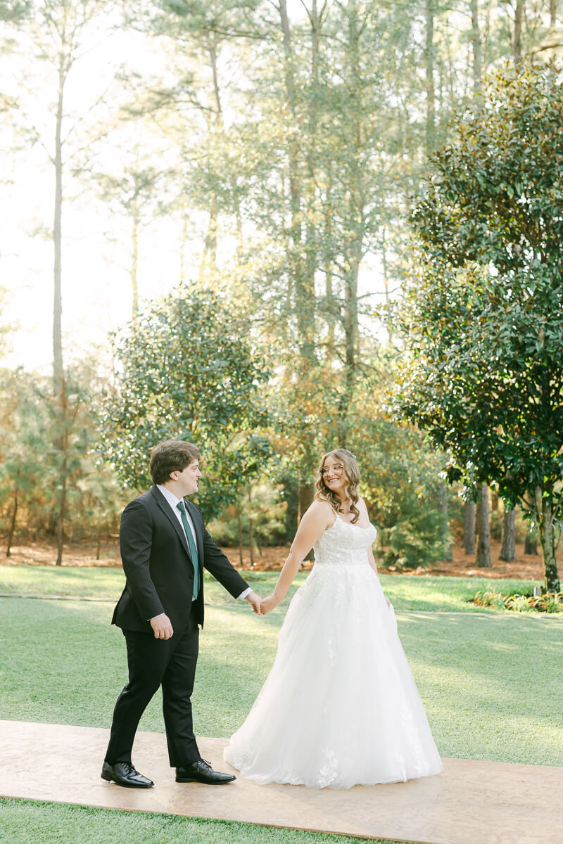 couple walking at the springs magnolia