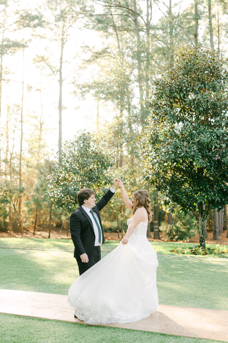 couple walking at the springs magnolia