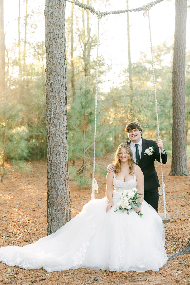 bride and groom posing for Houston wedding photographer 