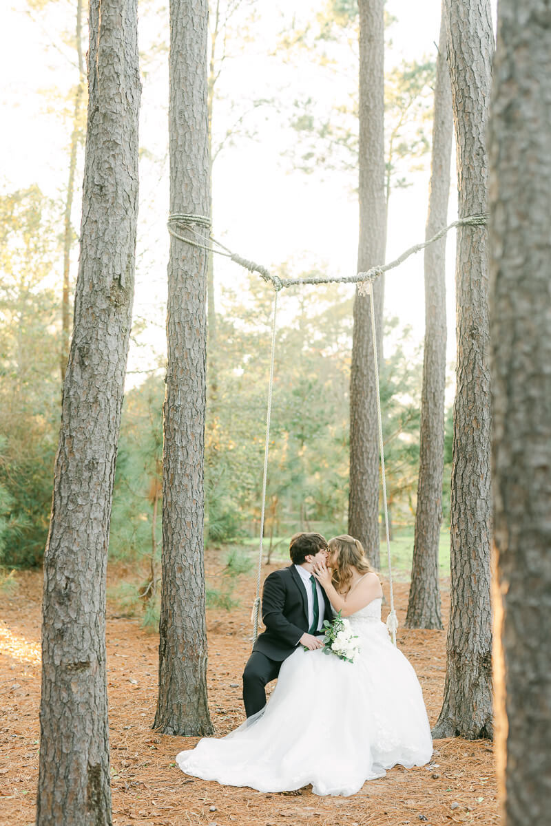 bride and groom posing for Houston wedding photographer 