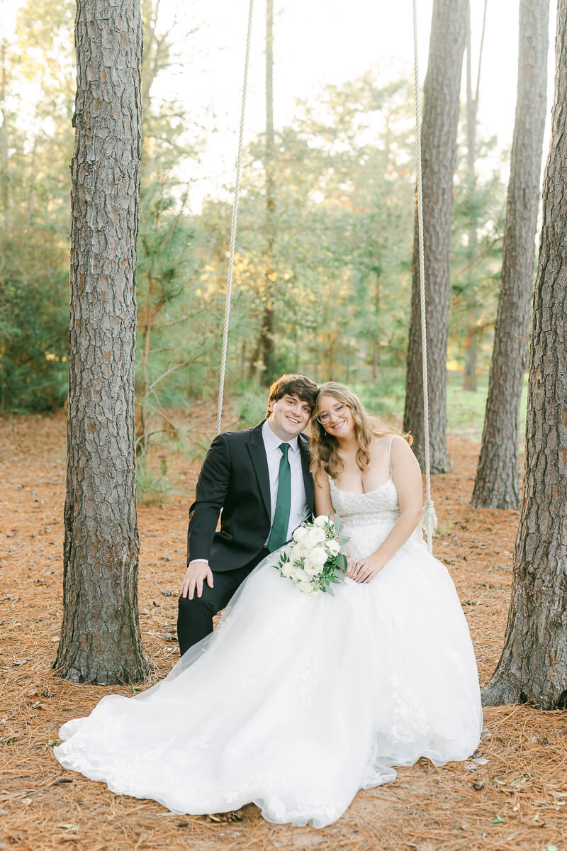 bride and groom posing for Houston wedding photographer 