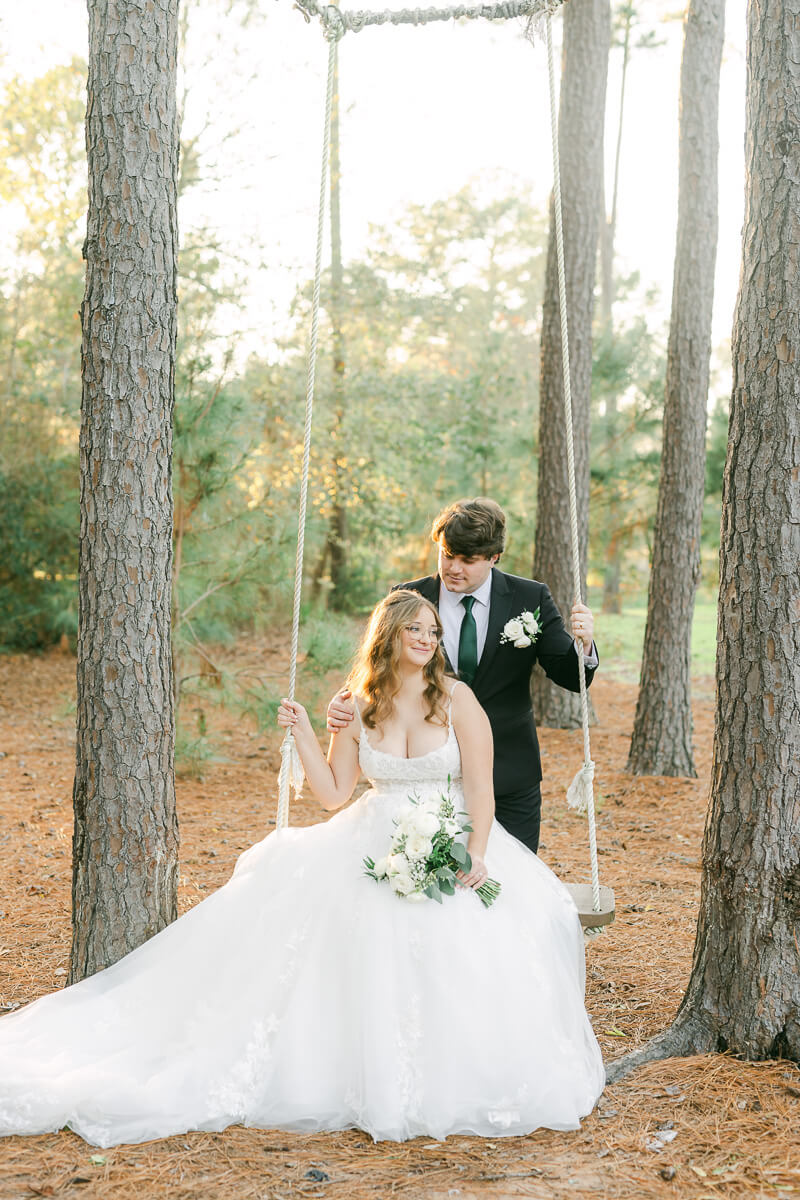 bride and groom posing for Houston wedding photographer 