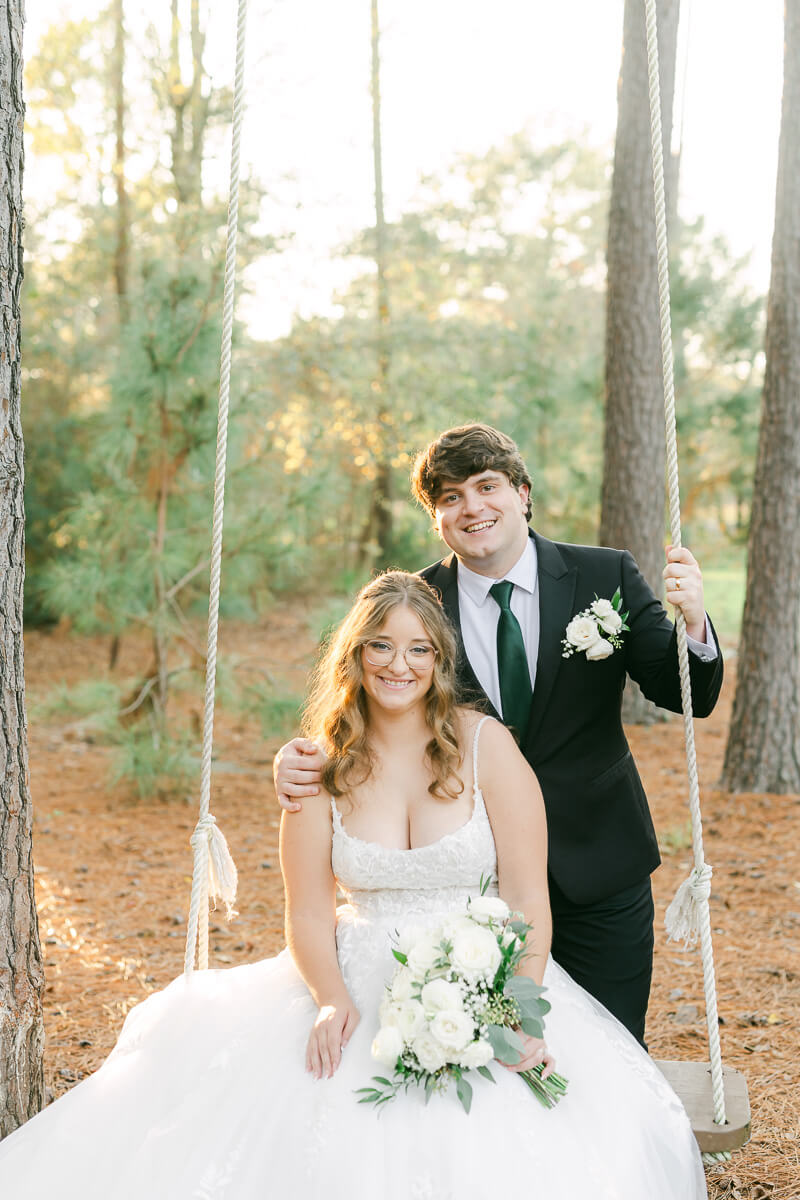 bride and groom posing for Houston wedding photographer 