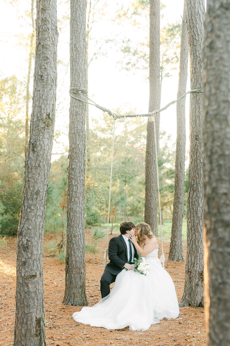 bride and groom posing for Houston wedding photographer 