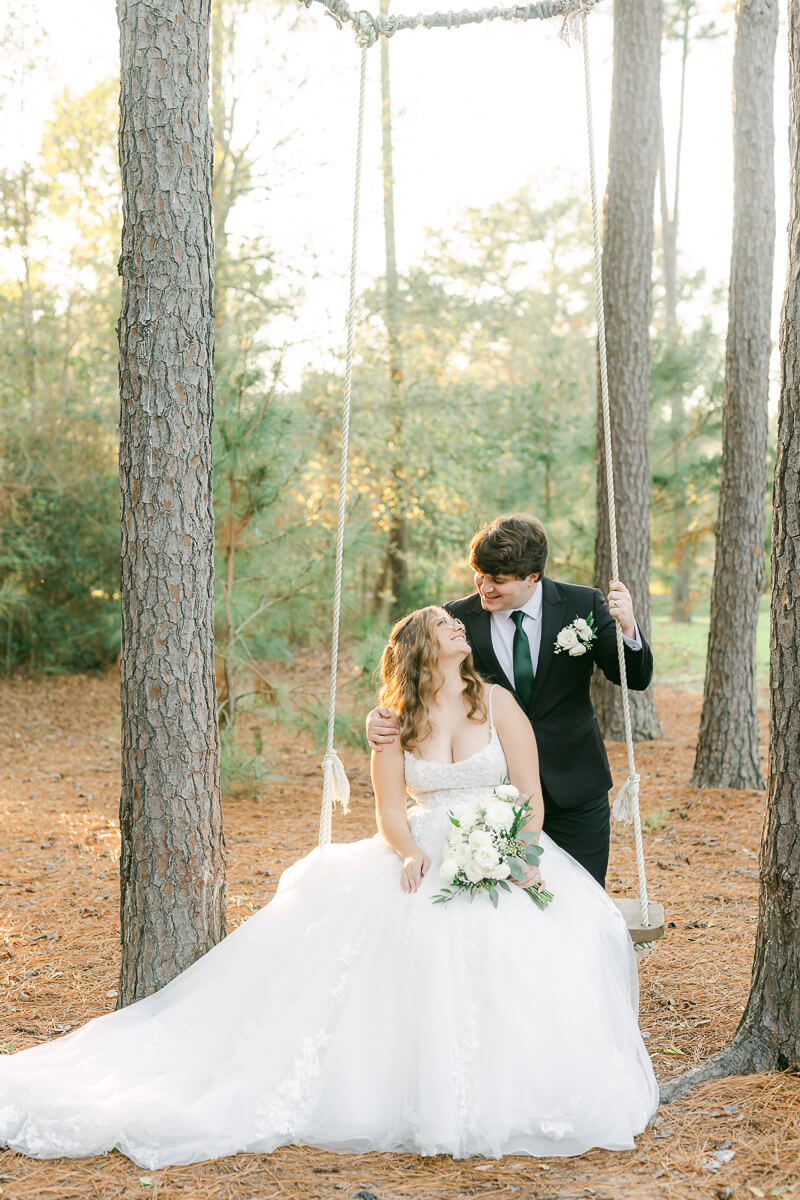 bride and groom posing for Houston wedding photographer 